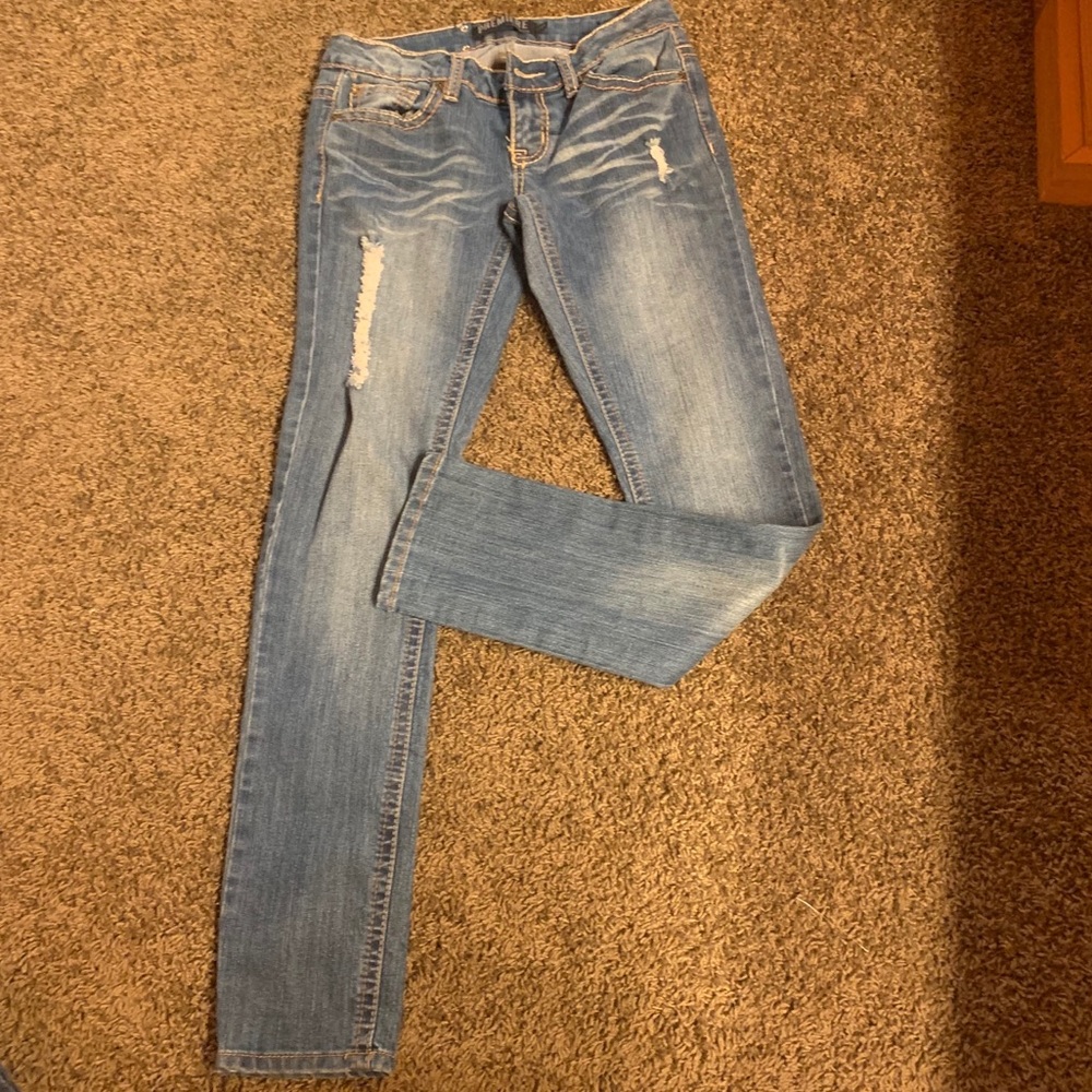 rue 21 - ripped jeans with jeweled back - size 1/2